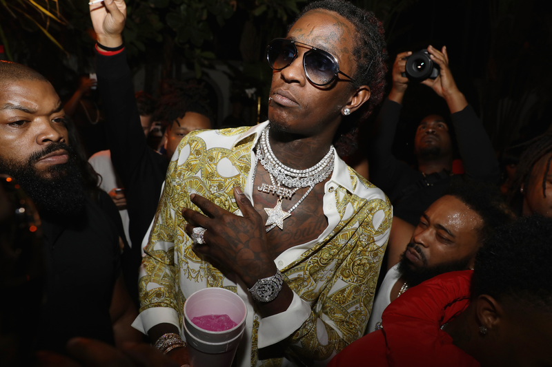 Young Thug wears a Versace for women blouse, $987 / Image via Getty
